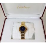 A fine ladies Cartier 18ct gold quartz blue dial w