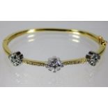 A 14ct gold bangle set with diamonds 22.5g