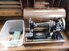 A Singer sewing machine with accessories