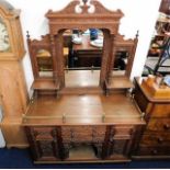 An unusual c.1900 heavily carved dresser with Chin