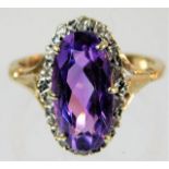 A 9ct gold ring set with diamond & amethyst 4.3g s