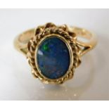 A 9ct gold black opal doublet ring 3.1g size N/O