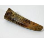 A small Sperm Whale tooth with dyed inscription Mo