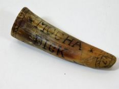 A small Sperm Whale tooth with dyed inscription Mo