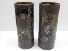 A pair of 19thC. Chinese brush pots with enamelled