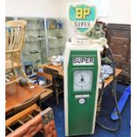 A vintage reproduction BP Super petrol pump with g