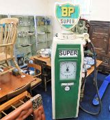 A vintage reproduction BP Super petrol pump with g