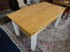 A Peter Blomfield kitchen table with painted legs