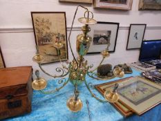 A large brass Christopher Wray light fitting