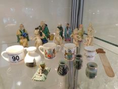 A small collection of miniature Chinese figures &