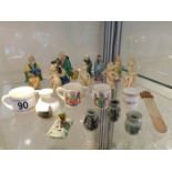 A small collection of miniature Chinese figures &