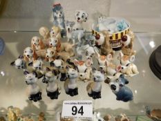 A collection of twenty five Wade Disney whimsie fi