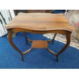A mahogany two tier table