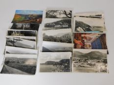 A quantity of various postcards, mostly topographi