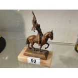 A small mounted bronze model of Joan Of Arc on hor