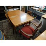 A teak G-Plan table & six chairs