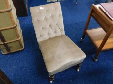A small upholstered nursing chair