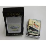 A Titanic Zippo lighter & one other