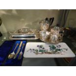 A 20thC. four piece silver plated tea set twinned