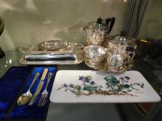 A 20thC. four piece silver plated tea set twinned