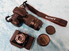 A Sony A200 SLR camera & Tamron 70-300mm 18-70mm l