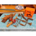 A box of various tools, including hand held & elec