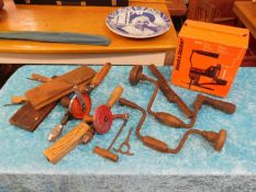 A box of various tools, including hand held & elec