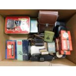 A box of miscellany items including cameras, binoc