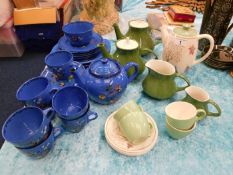 An Adderley blue tea set with enamelled decor twin