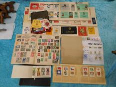 A quantity of stamps, match box covers & other ite