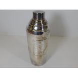 A silver plated cocktail shaker with inscribed rec