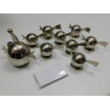 A set of eight bird style plated menu holders with
