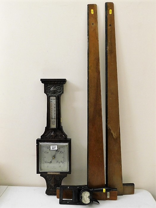 A barometer, damage to glass, two squares & a rect