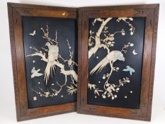 A pair of Chinese oak framed ivory, bone & mother