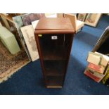 A mahogany single door cabinet