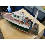A large model of a fishing trawler