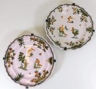 A pair of French Moustiers 18thC. faience plates 9.25in diameter decorated with fantastical animals