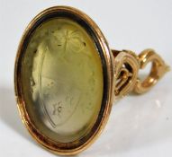 An 18thC. yellow metal seal, tests as high carat g