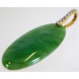 A jade pendant set with 9ct gold & diamond 8.6g