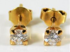 A pair of yellow metal, tested as 18ct gold, earri