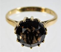 A 9ct gold ring with smokey quartz stone 3g size N