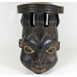 A large c.1900 carved African tribal art mask 16.5