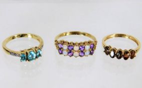 Three 9ct gold rings with mixed stones 6.7g