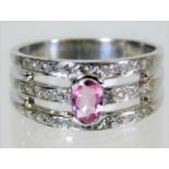 A 9ct white gold ring set with diamond & pink sapp