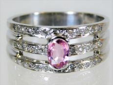 A 9ct white gold ring set with diamond & pink sapp