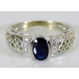 A 9ct white gold diamond & sapphire ring 3.4g size