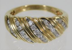 A yellow metal ring, tests as 9ct set with 0.5ct d