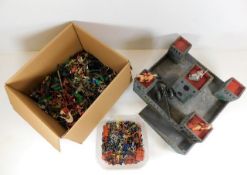 Two boxes of vintage toy soldiers & a model fort
