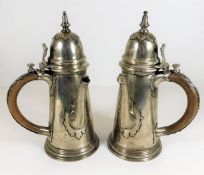 A pair of Edwardian silver hot chocolate pots with