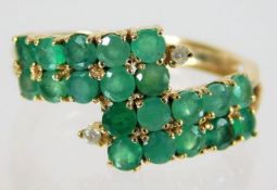 A 9ct gold emerald & diamond ring 2.1g size O